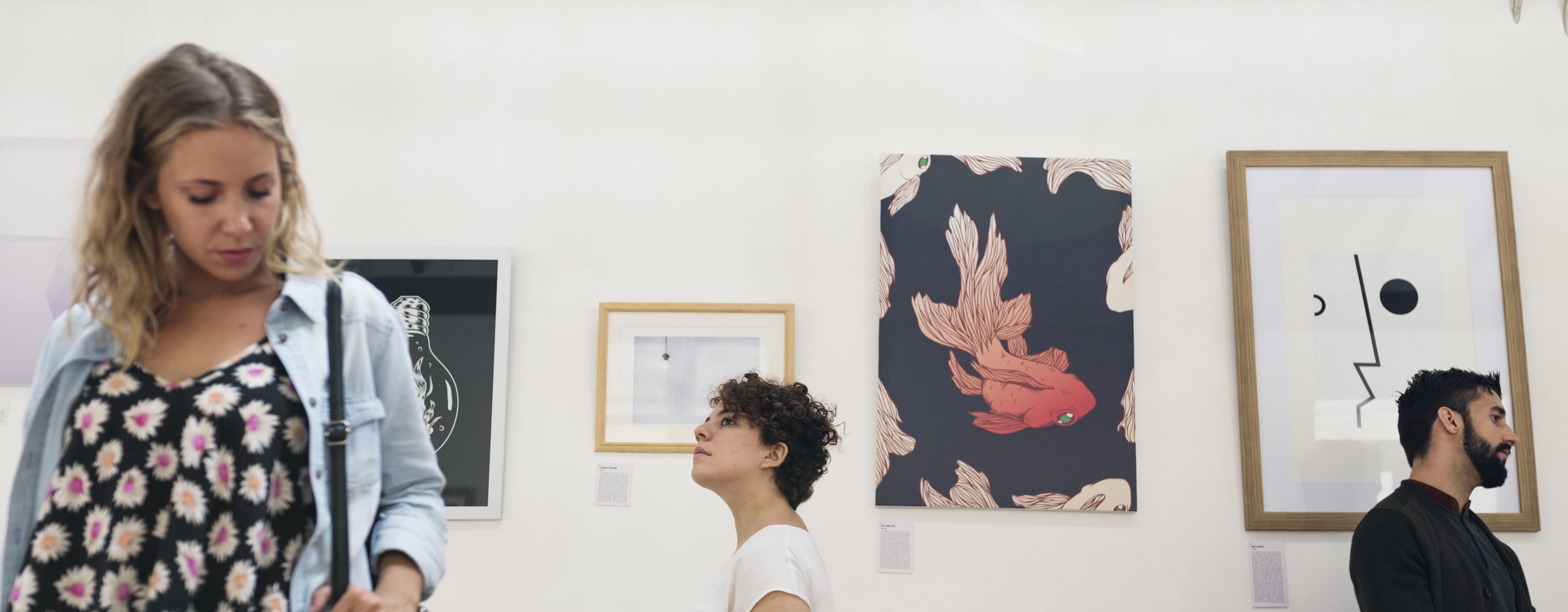 People attending an art exhibition